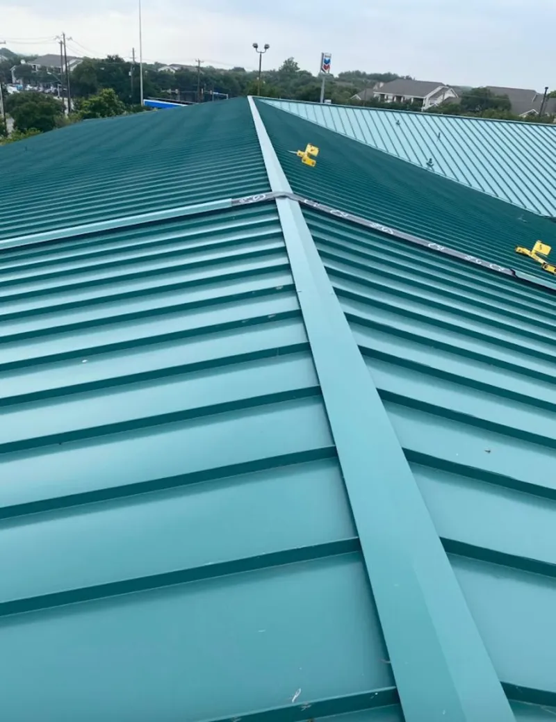 Green commercial metal roof ridge and valley for Metal Roof Repair in Lower Heidelberg