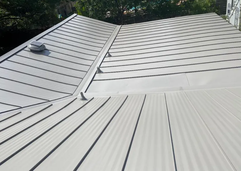 Solar attic fan installed on a metal roof for Roof Ventilation in Lower Heidelberg